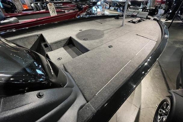 2025 Tracker Savage 215 boat interior with spacious deck and storage compartments.
