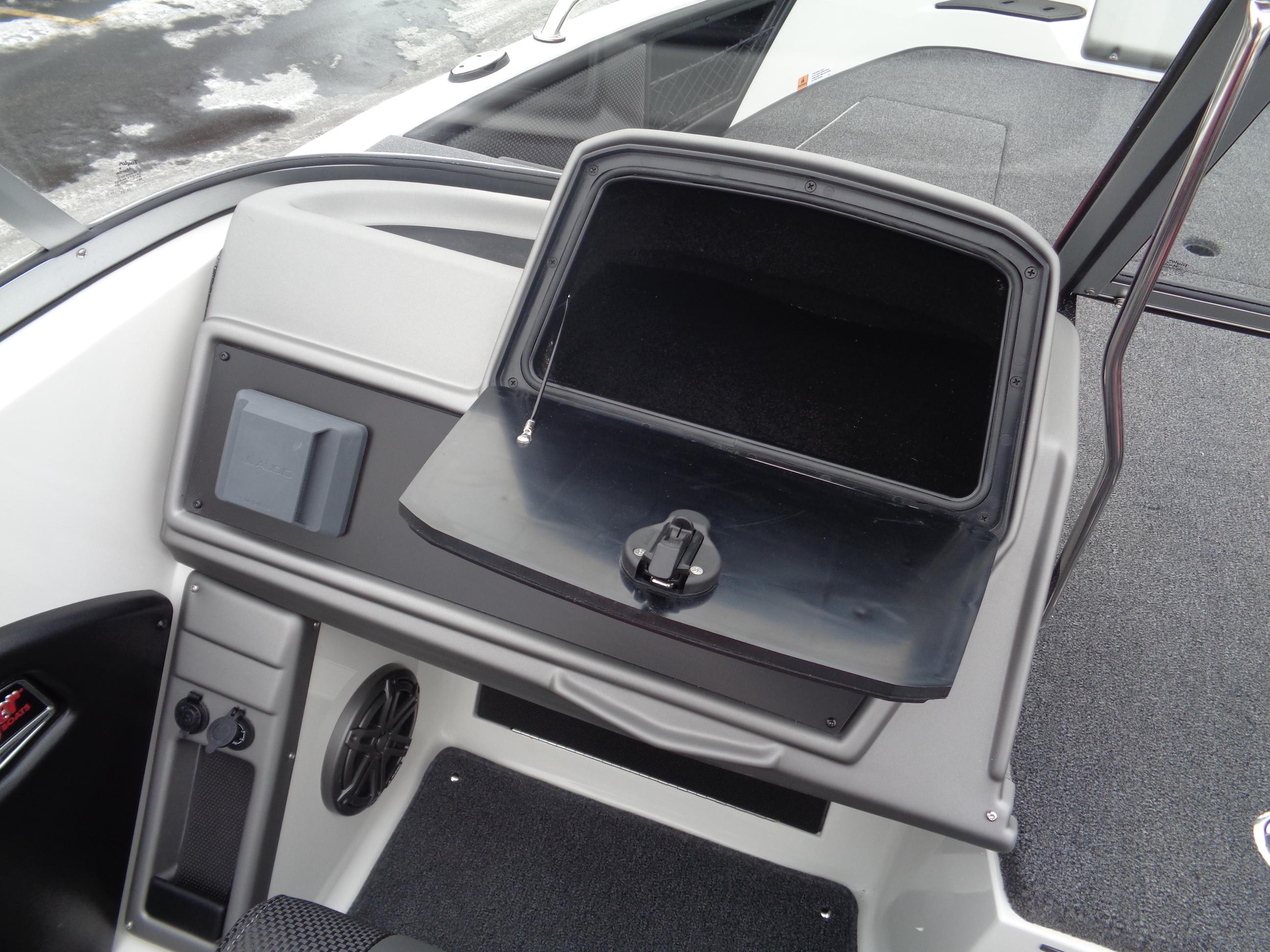 2025 Ranger 1880 MS Angler boat dashboard with open storage compartment.