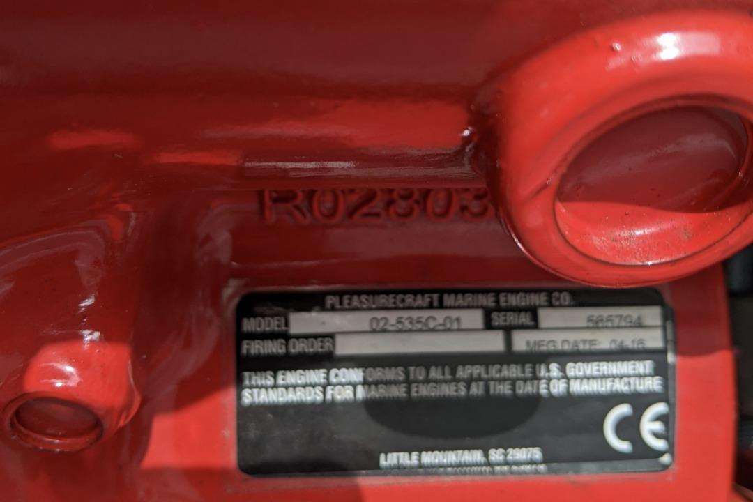 Close-up of a 2016 Nautique Ski Nautique 200 engine label and serial number.