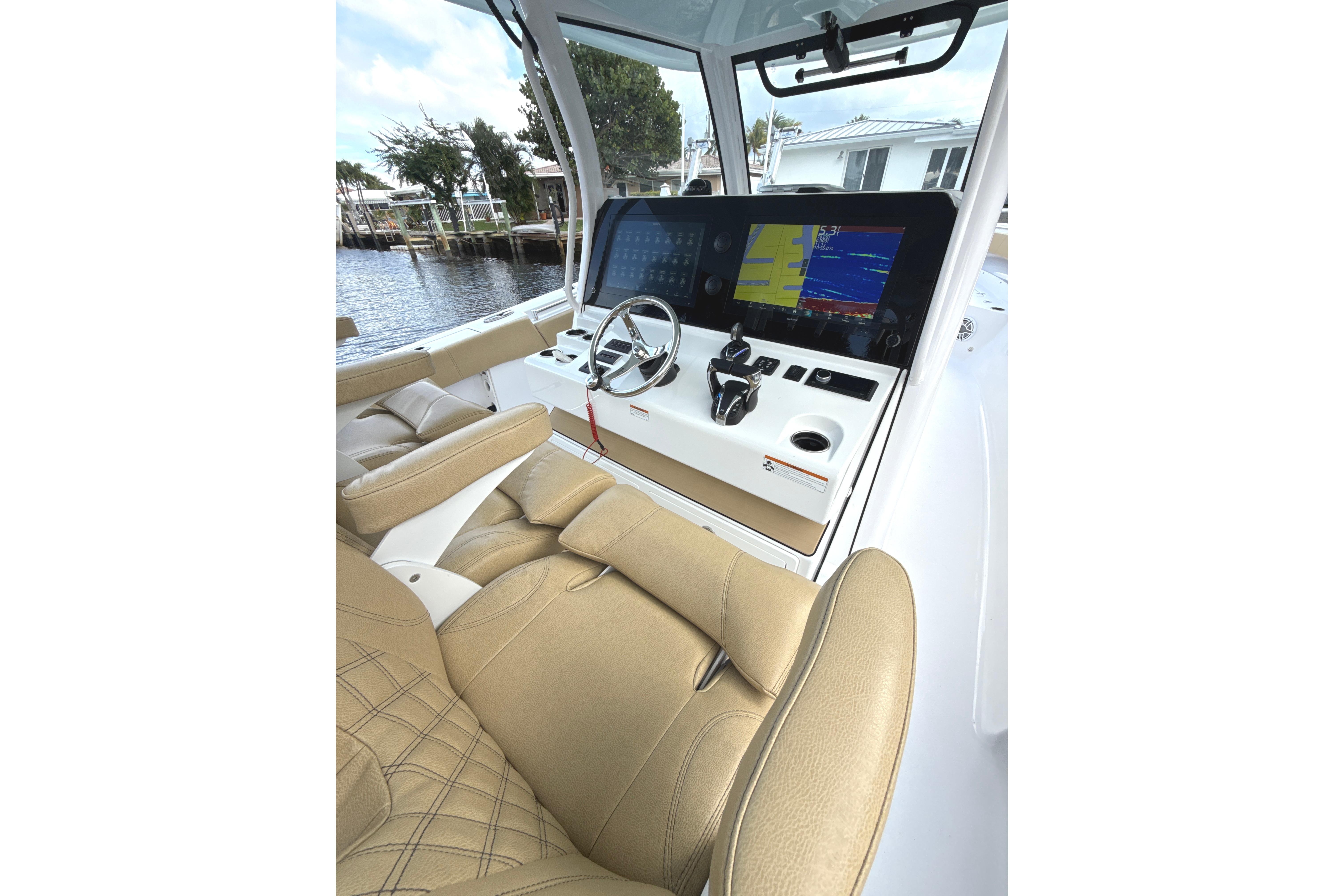 2023 Sportsman Open 352 Center Console helm with advanced navigation displays and luxurious seating.