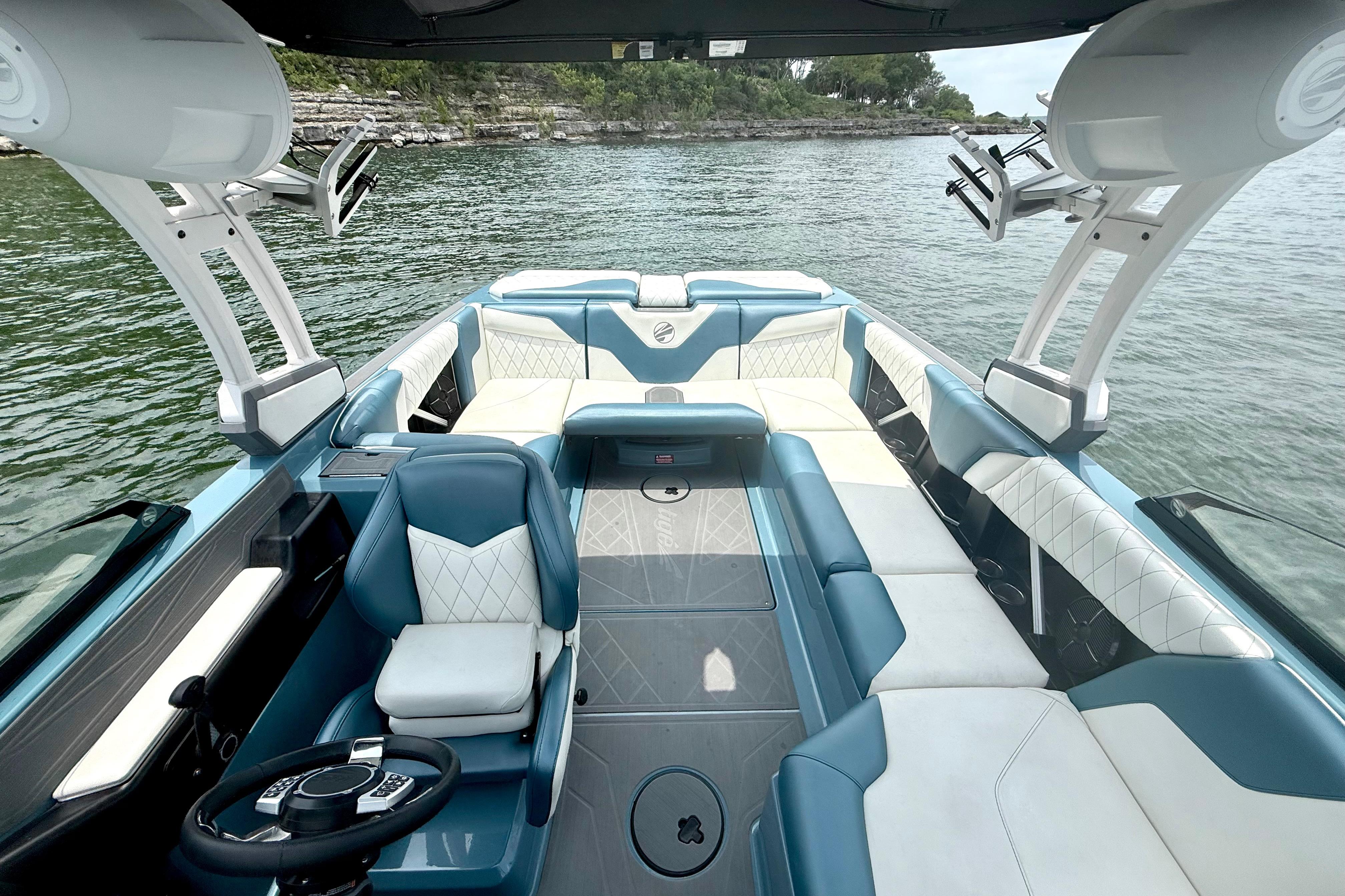 2021 Tige Z3 boat interior with luxurious seating on a serene lake.
