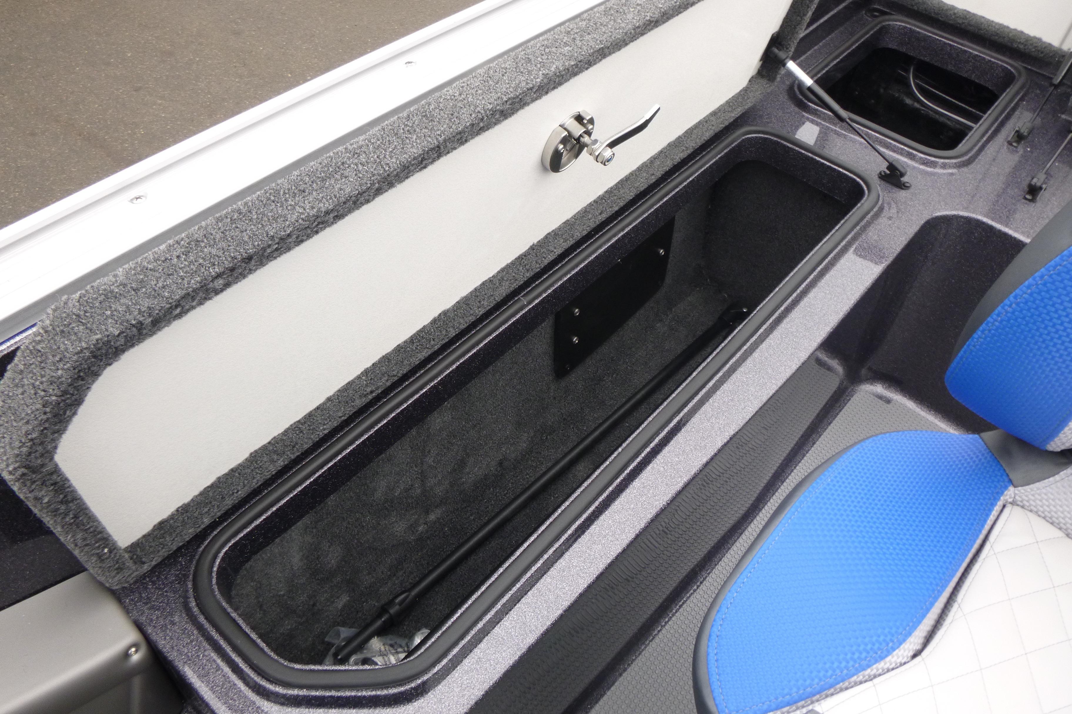 2026 Ranger 620FS Cup Equipped boat storage compartment with blue seating detail.
