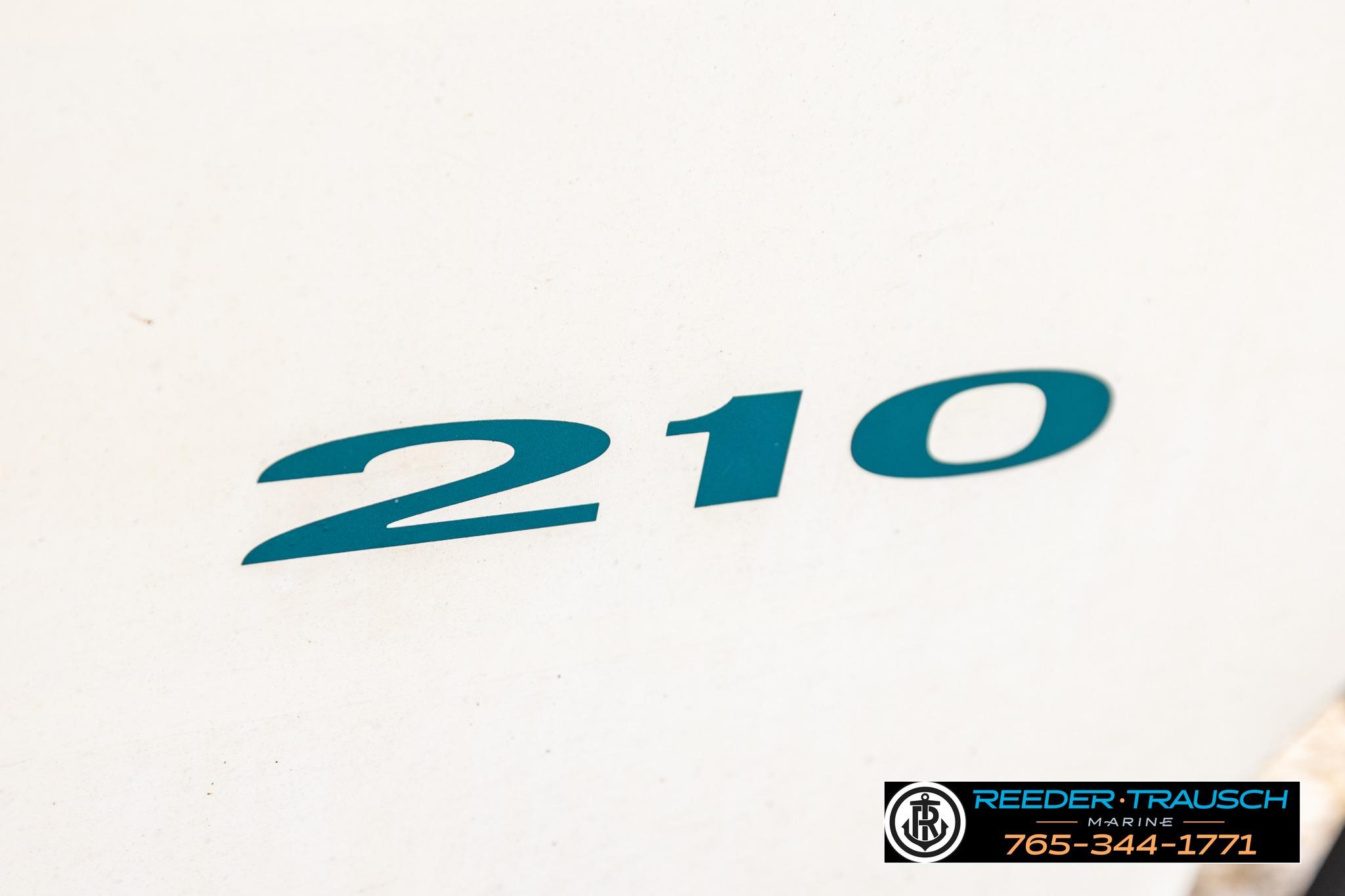 Sea Ray 210 Bow Rider 1996 model number on boat hull.
