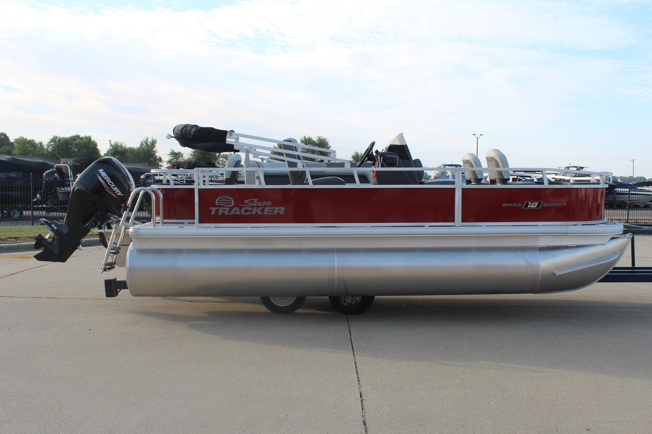 2026 Sun Tracker Bass Buggy 18 DLX pontoon boat with Mercury outboard motor.