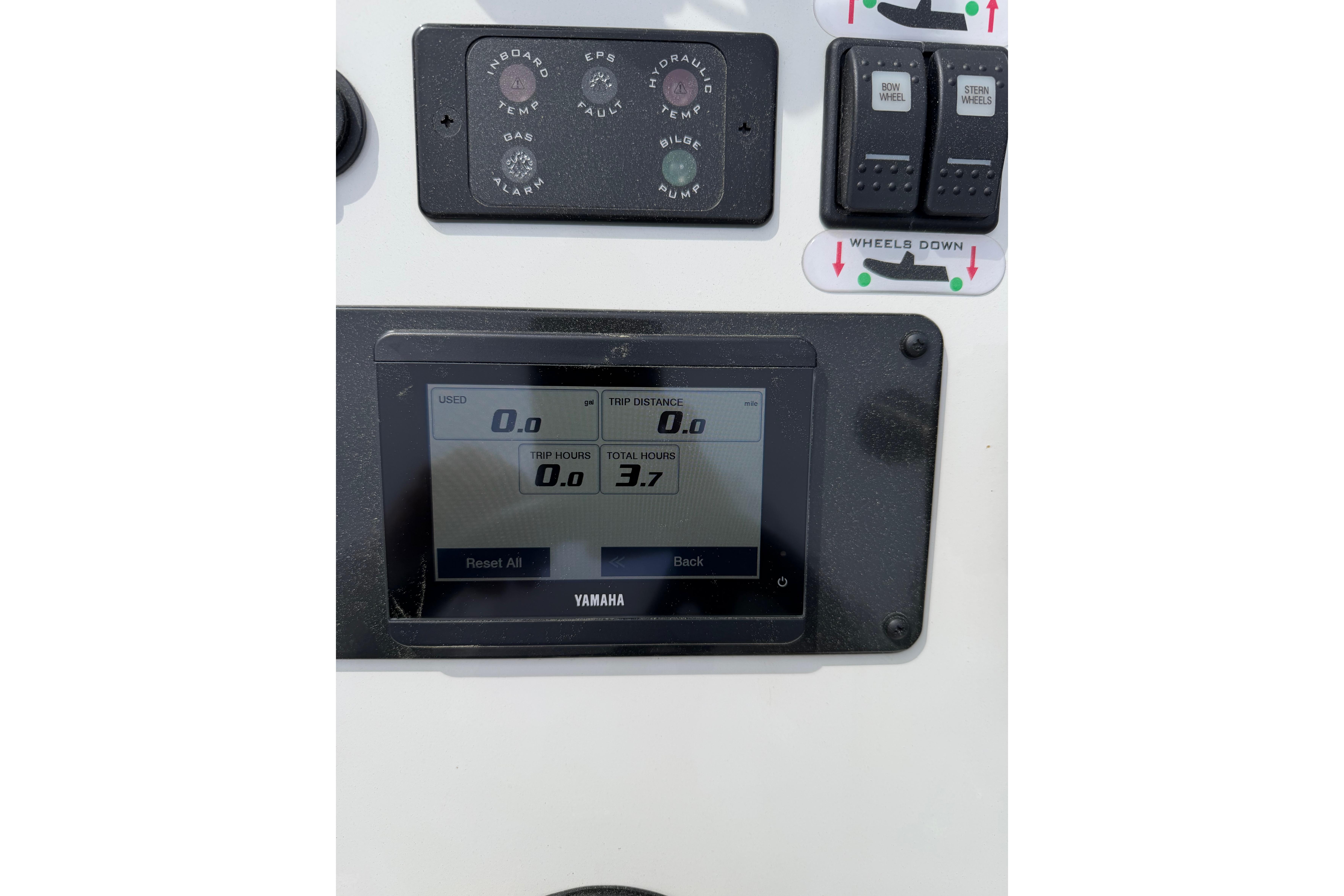 Control panel of 2024 Sealegs 7.1m RIB with Yamaha display and wheel controls.