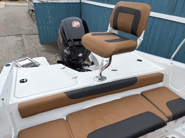 2025 Tahoe 185 S boat with brown seating and powerful outboard motor.
