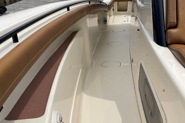 2020 Scout 420 LXF boat interior with tan seating and sleek design.
