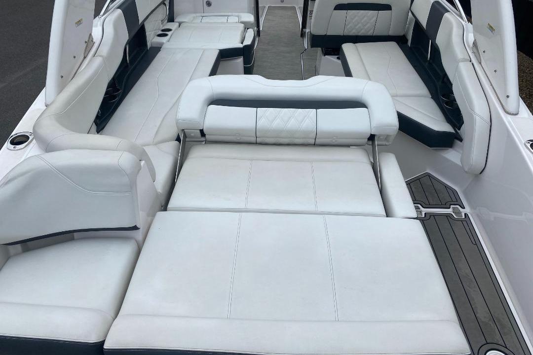 2018 Regal 26 FasDeck boat interior with spacious white seating and sleek design.