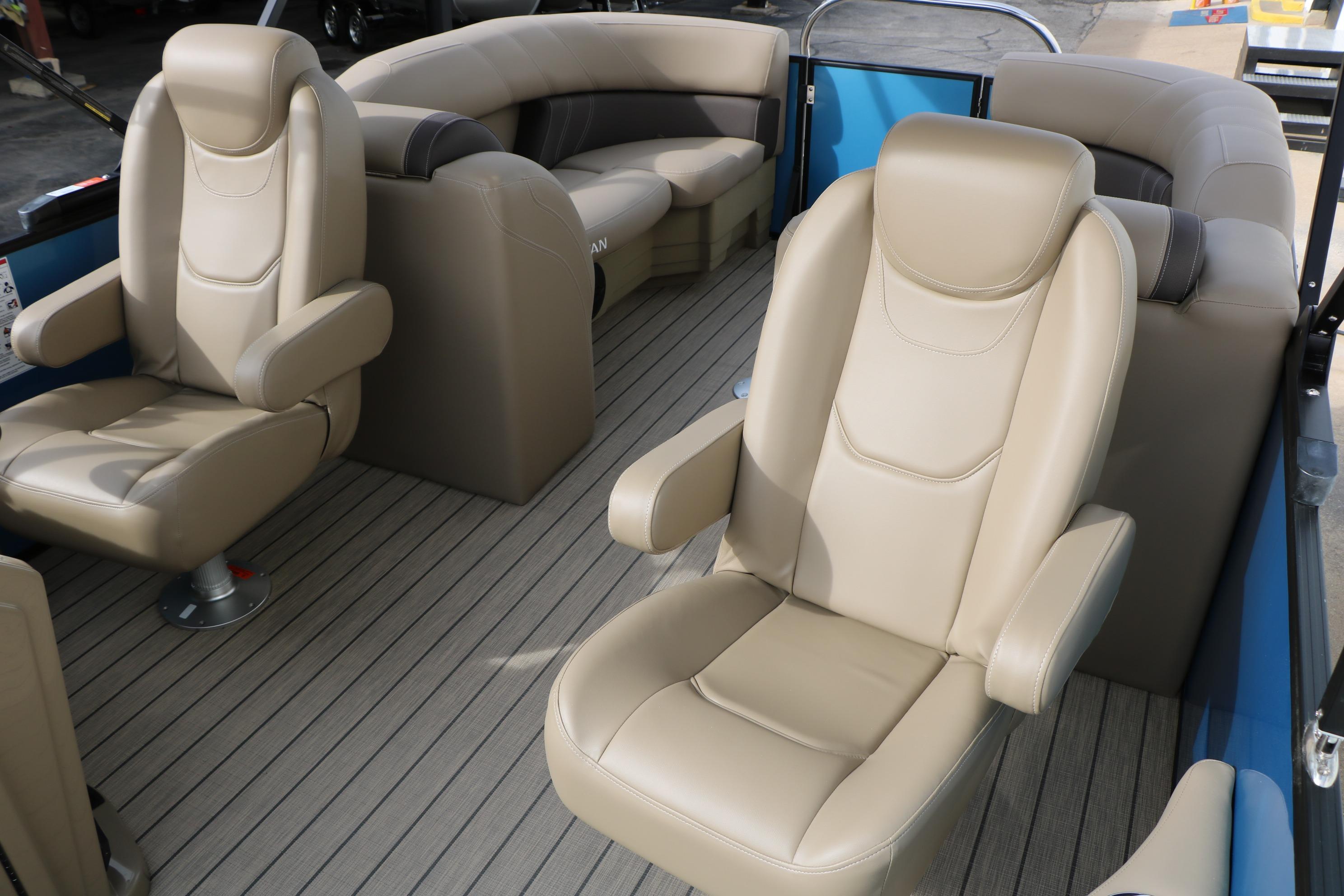 Luxurious interior of 2026 Sylvan Mirage 822 LZ pontoon boat with plush seating.