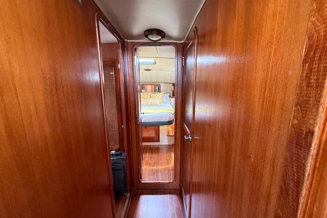 Interior hallway of 1982 Lancer 45 Motorsailer with wooden paneling and visible cabin.