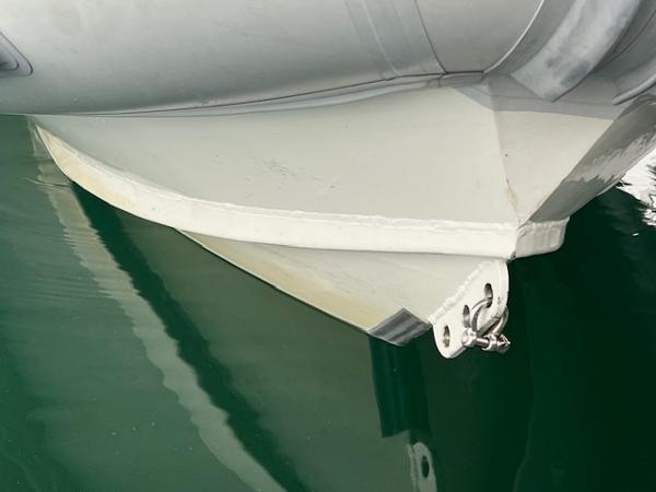 2017 Highfield OM 500 boat hull in water.