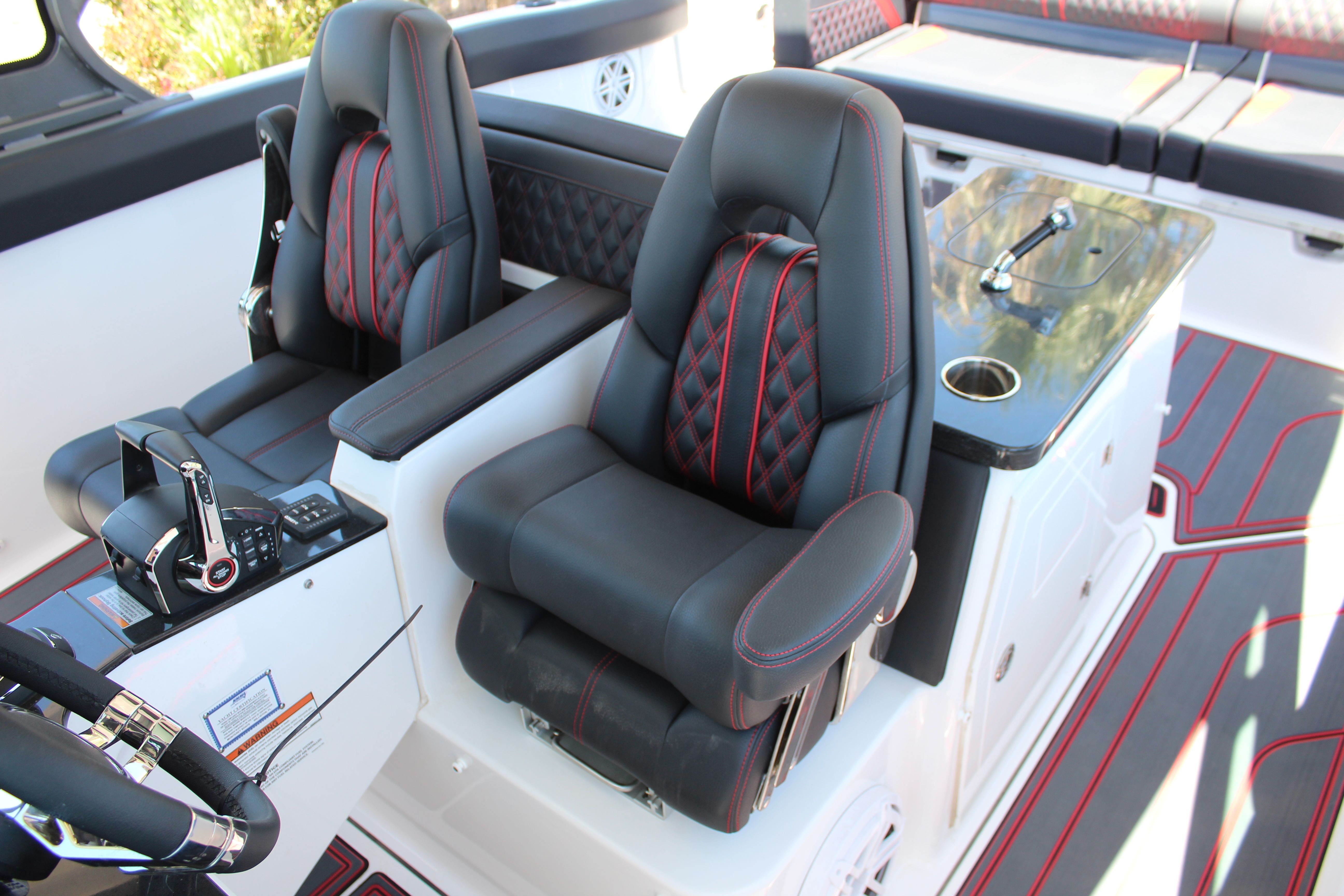 Luxurious seating in the 2025 Monterey Elite 30 OB boat.