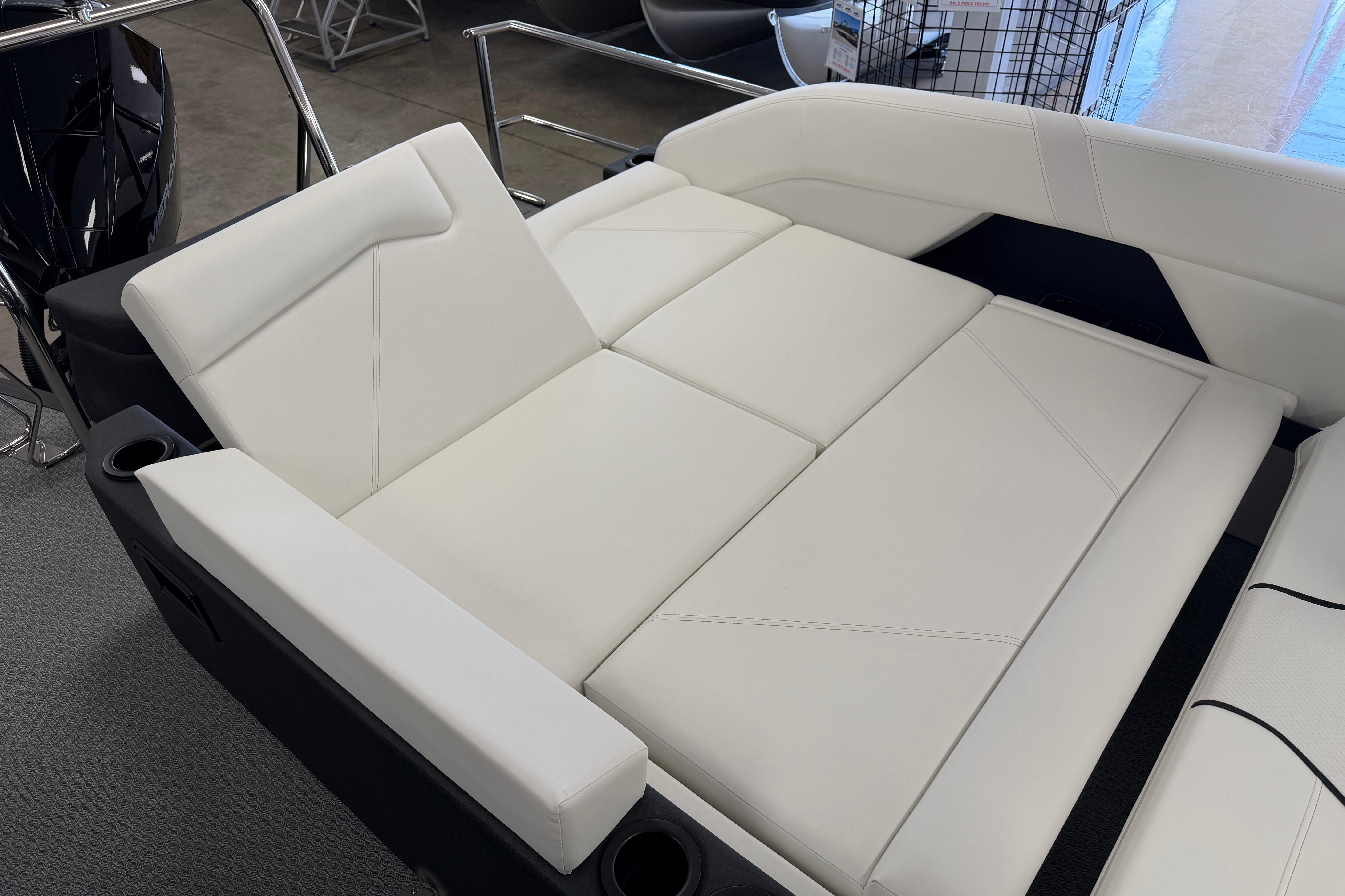 Luxurious white seating on 2026 Evotti 721CS boat, featuring sleek design and comfort.