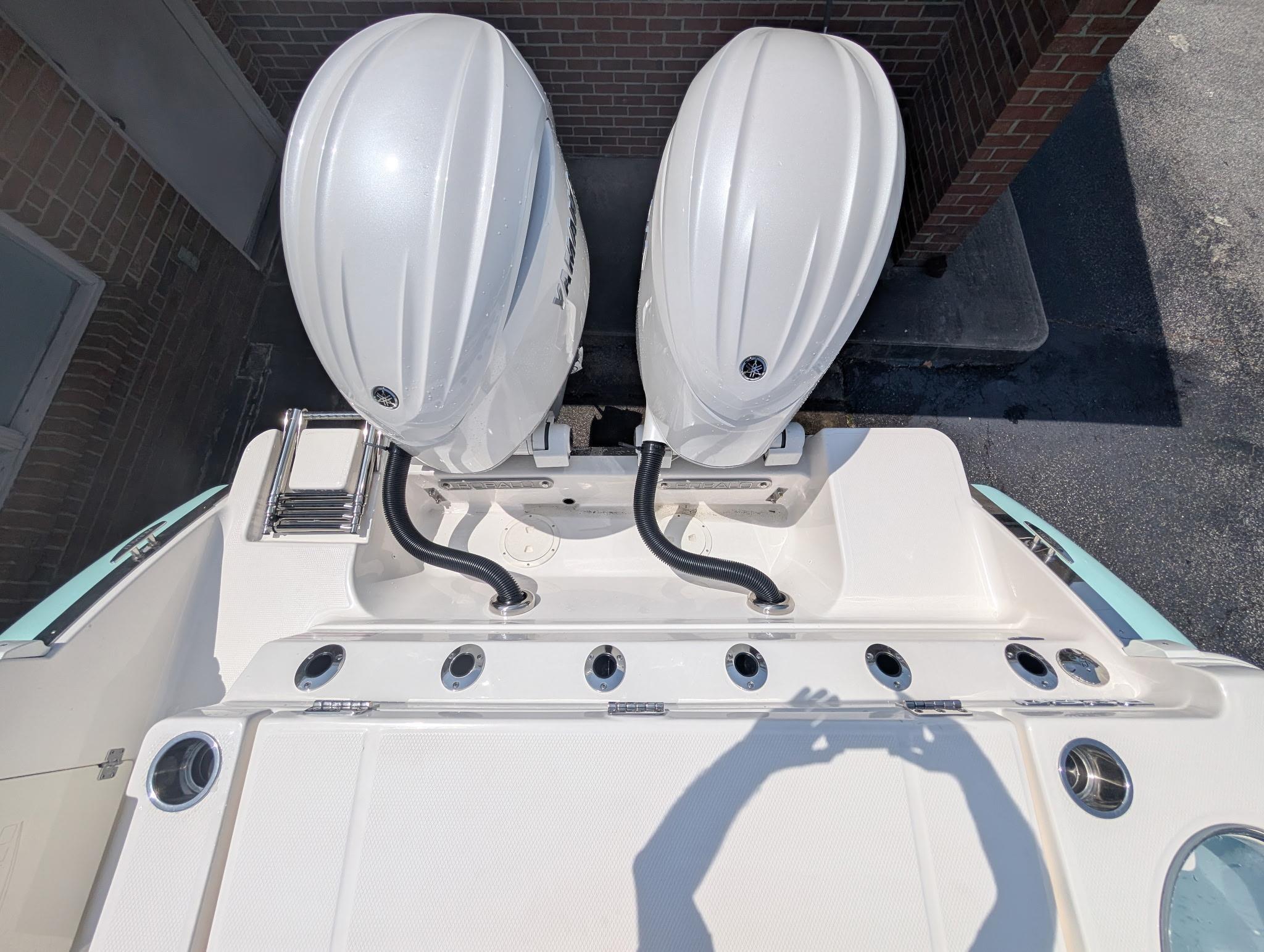 2025 Robalo R250 Center Console with dual outboard engines, viewed from above.
