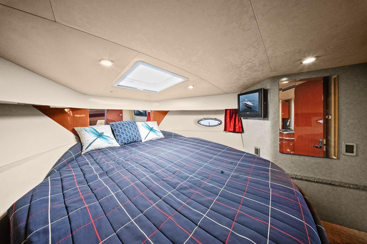 Interior of 2008 Formula 40 Performance Cruiser with cozy bed and modern amenities.