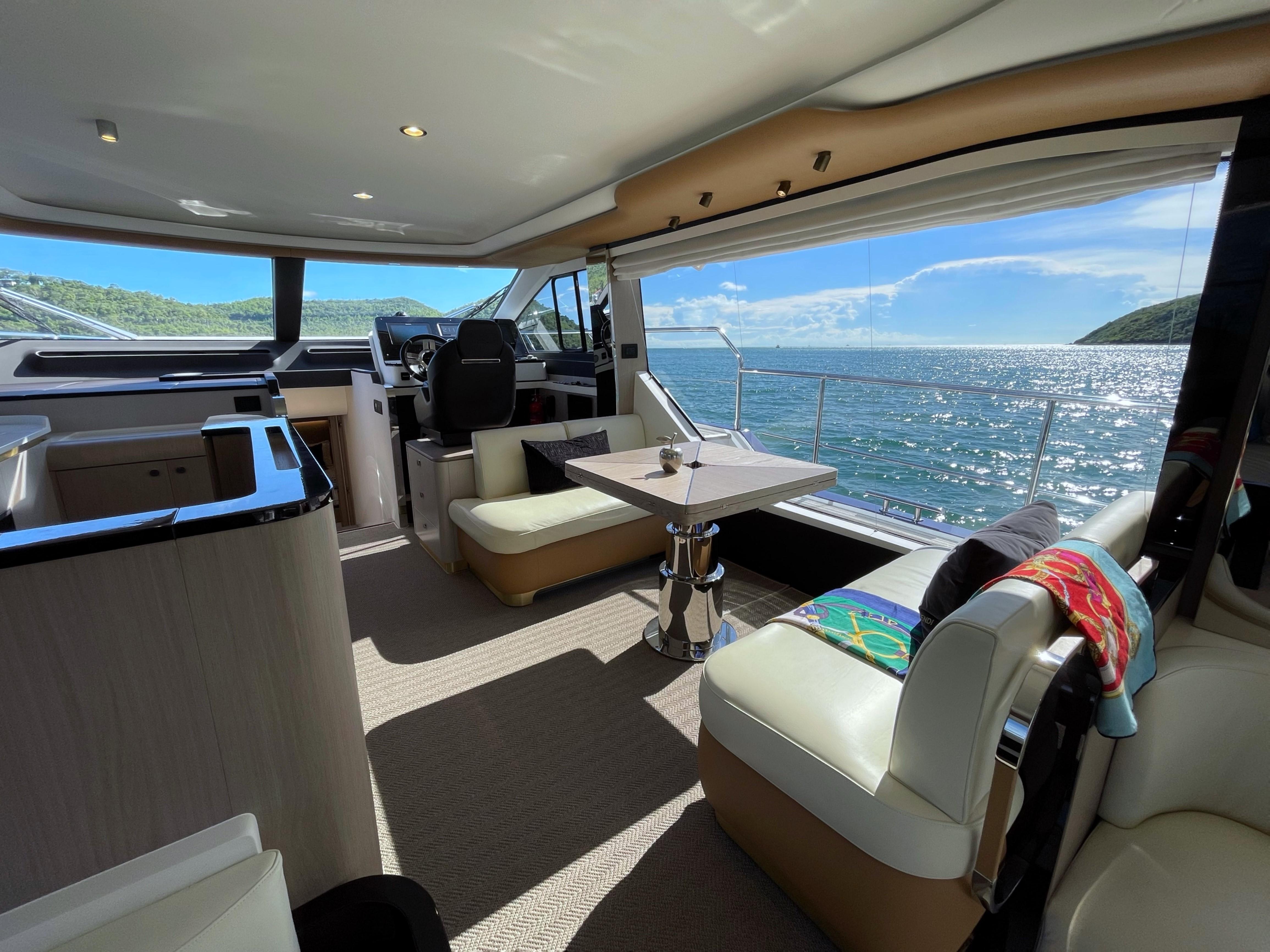 Luxurious interior of a 2020 Azimut 60 yacht with ocean view.