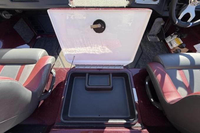 2026 Nitro Z21 XL Pro boat interior with open storage compartment between seats.