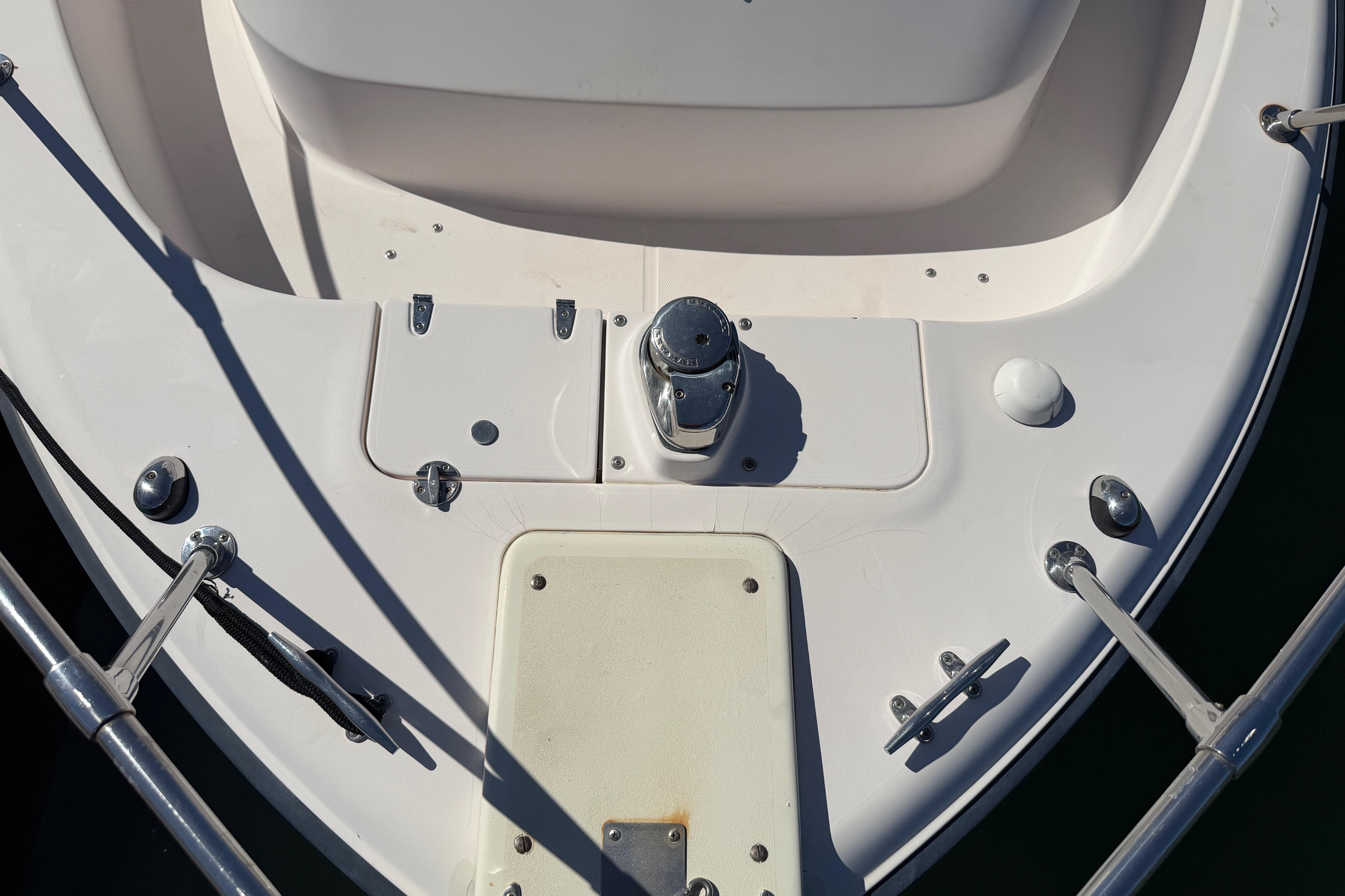 Bow of 2006 Grady-White Sailfish 282 boat with anchor winch and cleats.