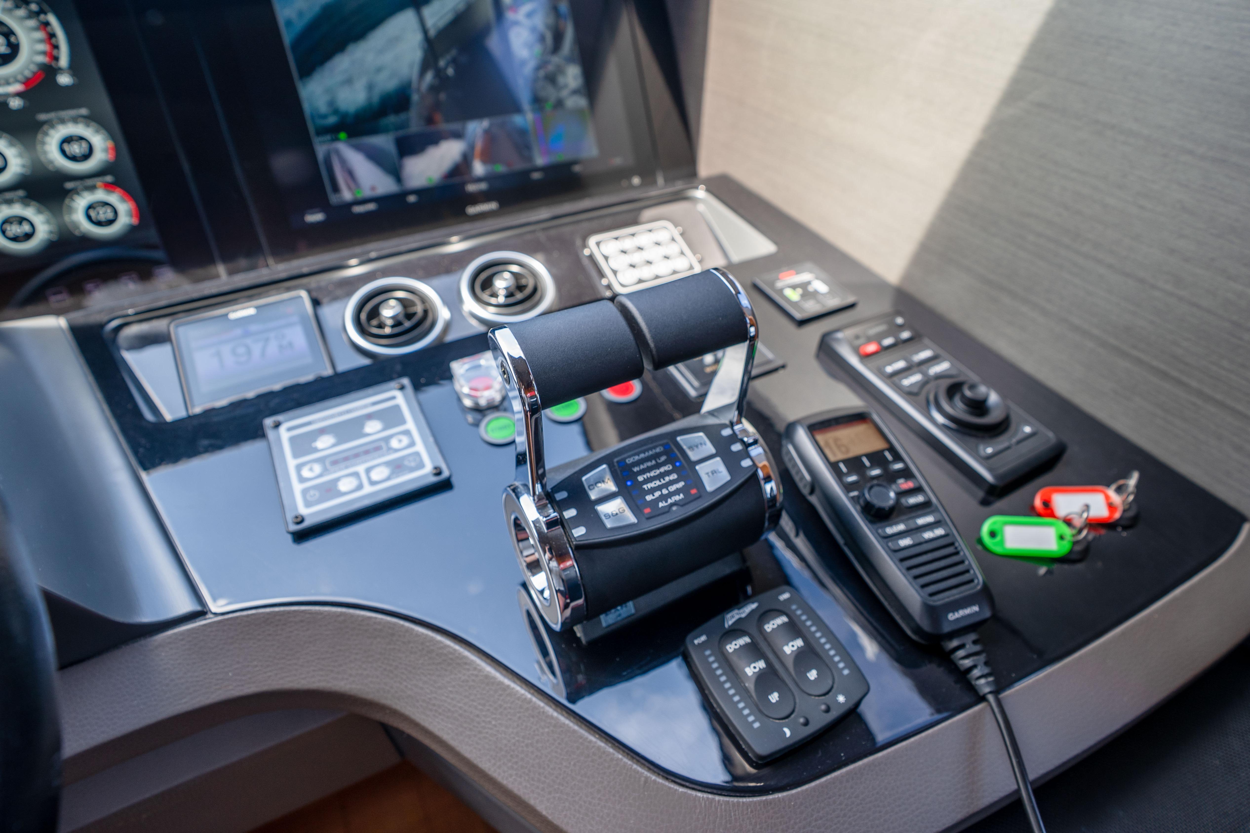 Control panel of a 2020 Princess Y85 yacht with navigation and communication equipment.