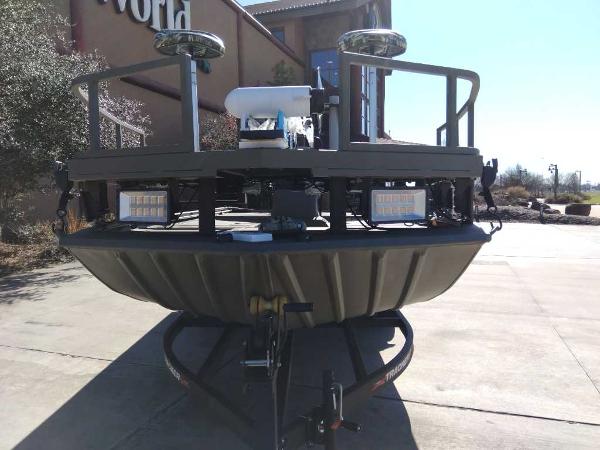 2024 Tracker Grizzly 2072 CC Sportsman boat on trailer, front view.