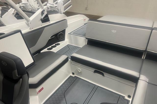 2025 Cobalt CS23 Surf boat interior with sleek gray seating and modern design.