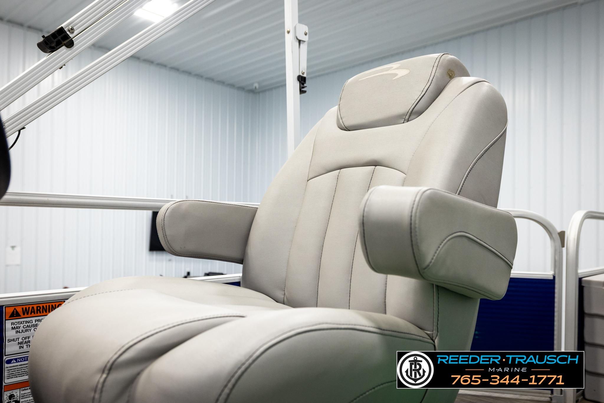 Luxurious seating on a 2021 Bennington 20 SV pontoon boat, featuring plush upholstery.