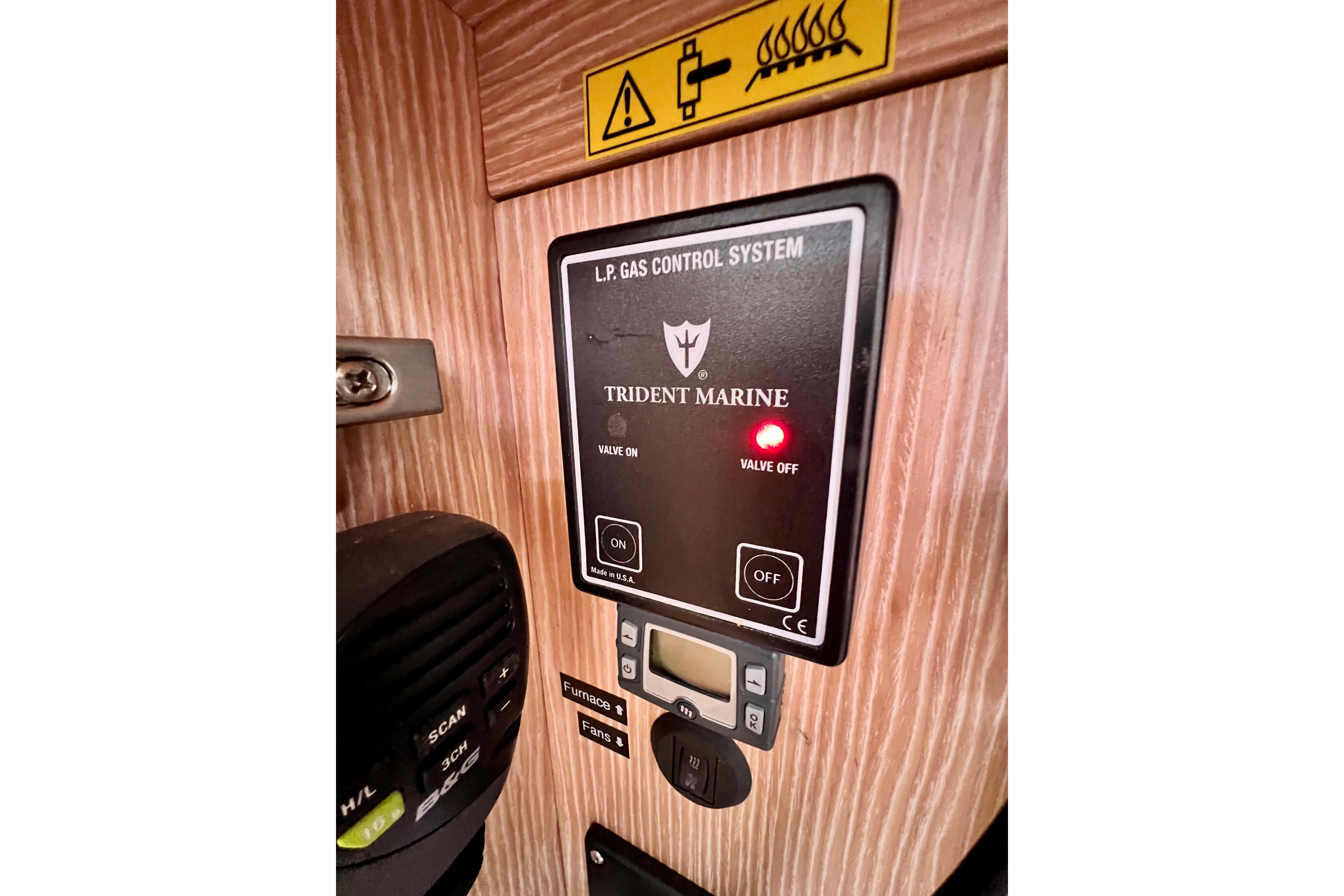 LP gas control system panel on 2016 Hanse 455 yacht, featuring Trident Marine controls.