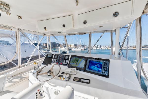 Interior view of 1999 Viking 47 Convertible yacht cockpit with navigation equipment.