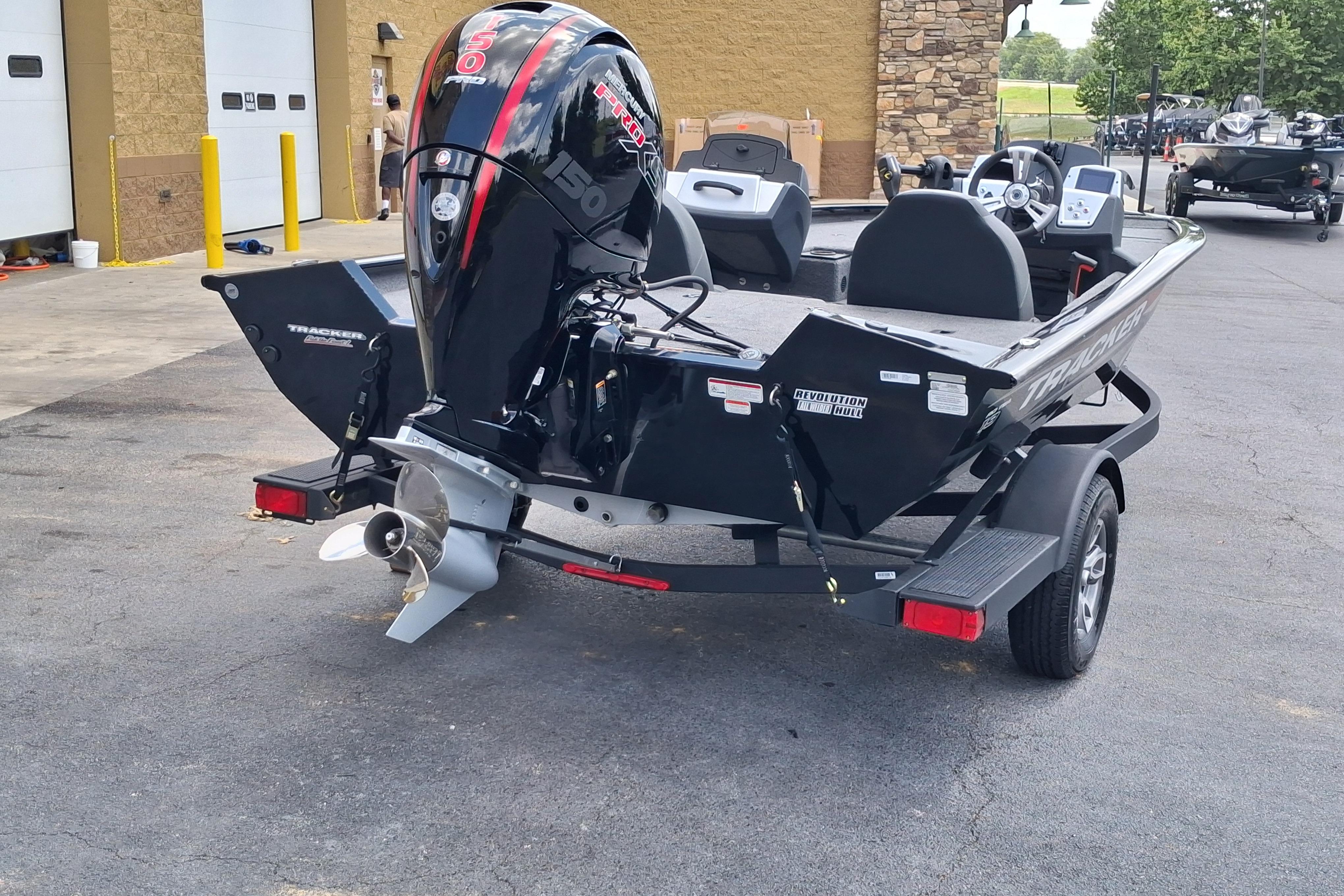 2025 Tracker Pro Team 195 Tournament Edition boat with powerful outboard motor.