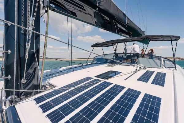 2025 Privilege Signature 650 yacht with solar panels sailing on a sunny day.