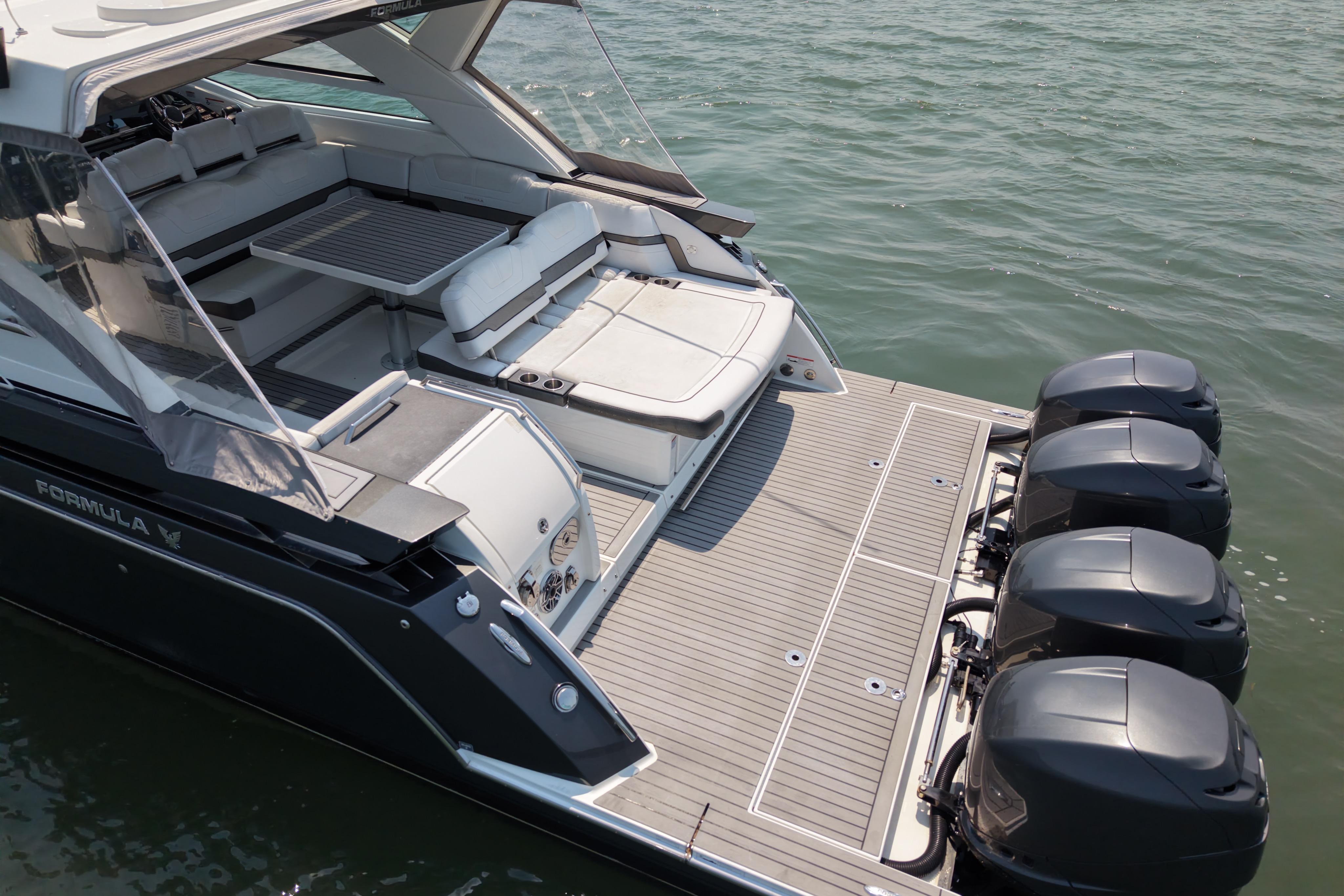 2019 Formula 430 Super Sport Crossover boat with spacious deck and four powerful engines.