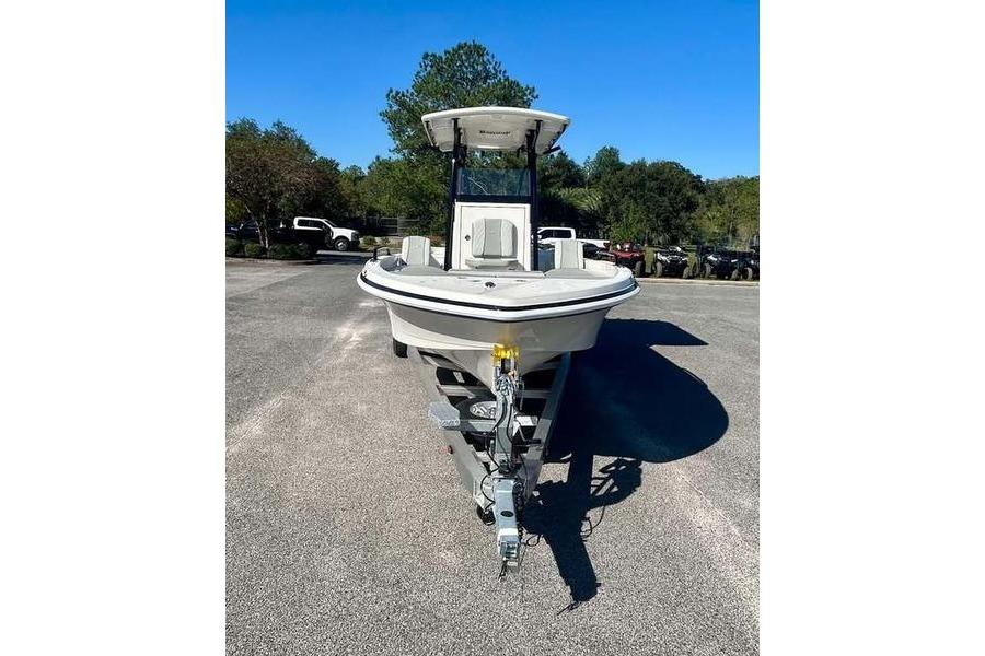 2026 Ranger 2360 Bay boat on trailer, parked outdoors under clear blue sky.