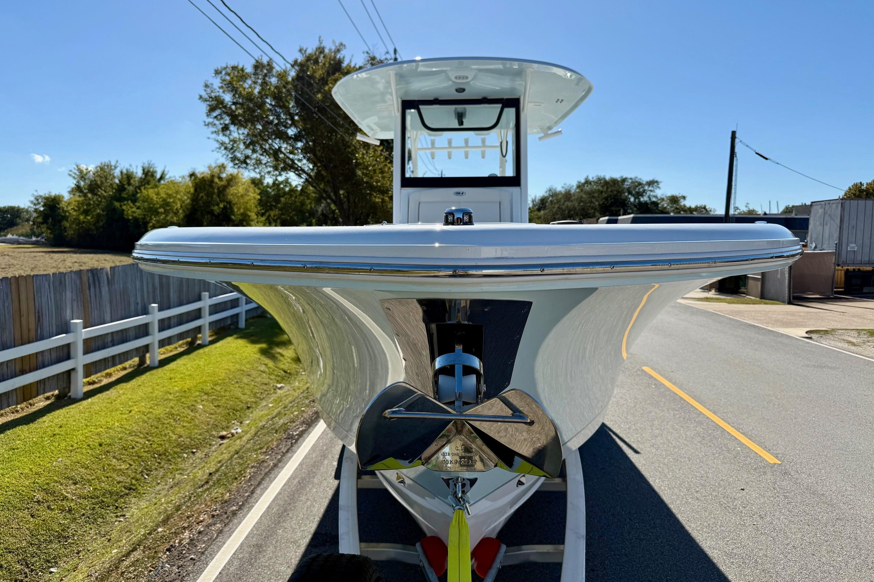2026 Sea Hunt Gamefish 30 Coffin Box boat on trailer, front view, sunny day.