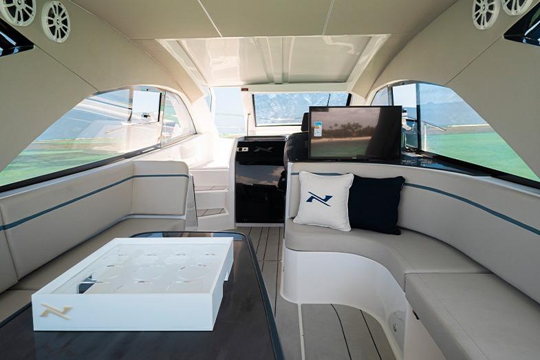 Luxurious interior of 2025 NX Boats NX41 HORIZON with elegant seating and modern amenities.