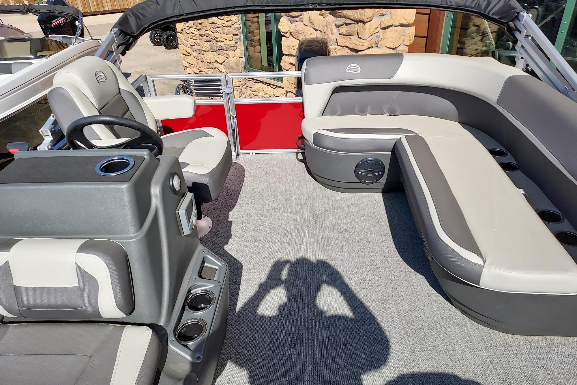 2026 Sun Tracker Bass Buggy 16 XL Select interior with seating and steering console.