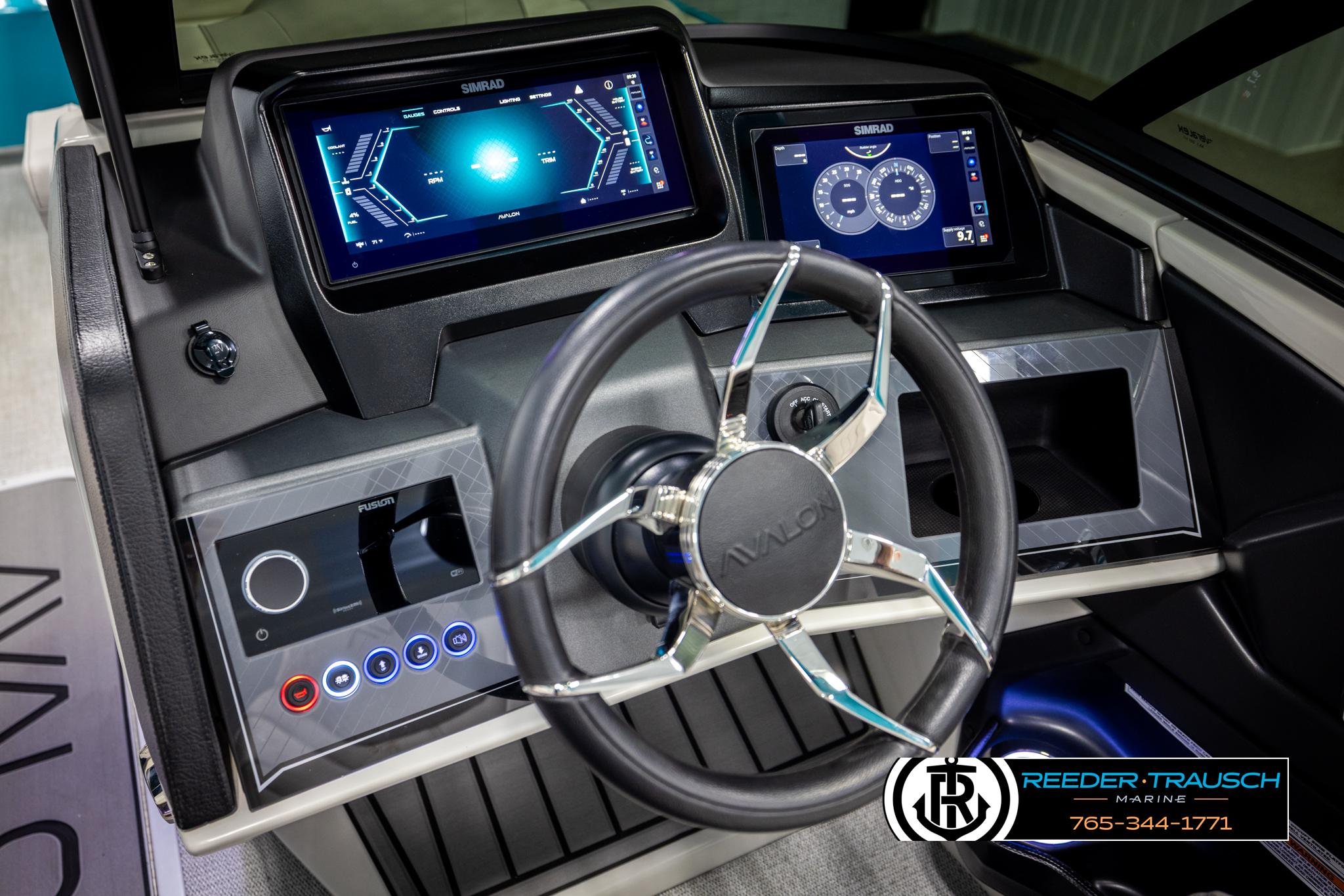Steering console of 2025 Avalon 2585 Excal VRBW with advanced digital displays.