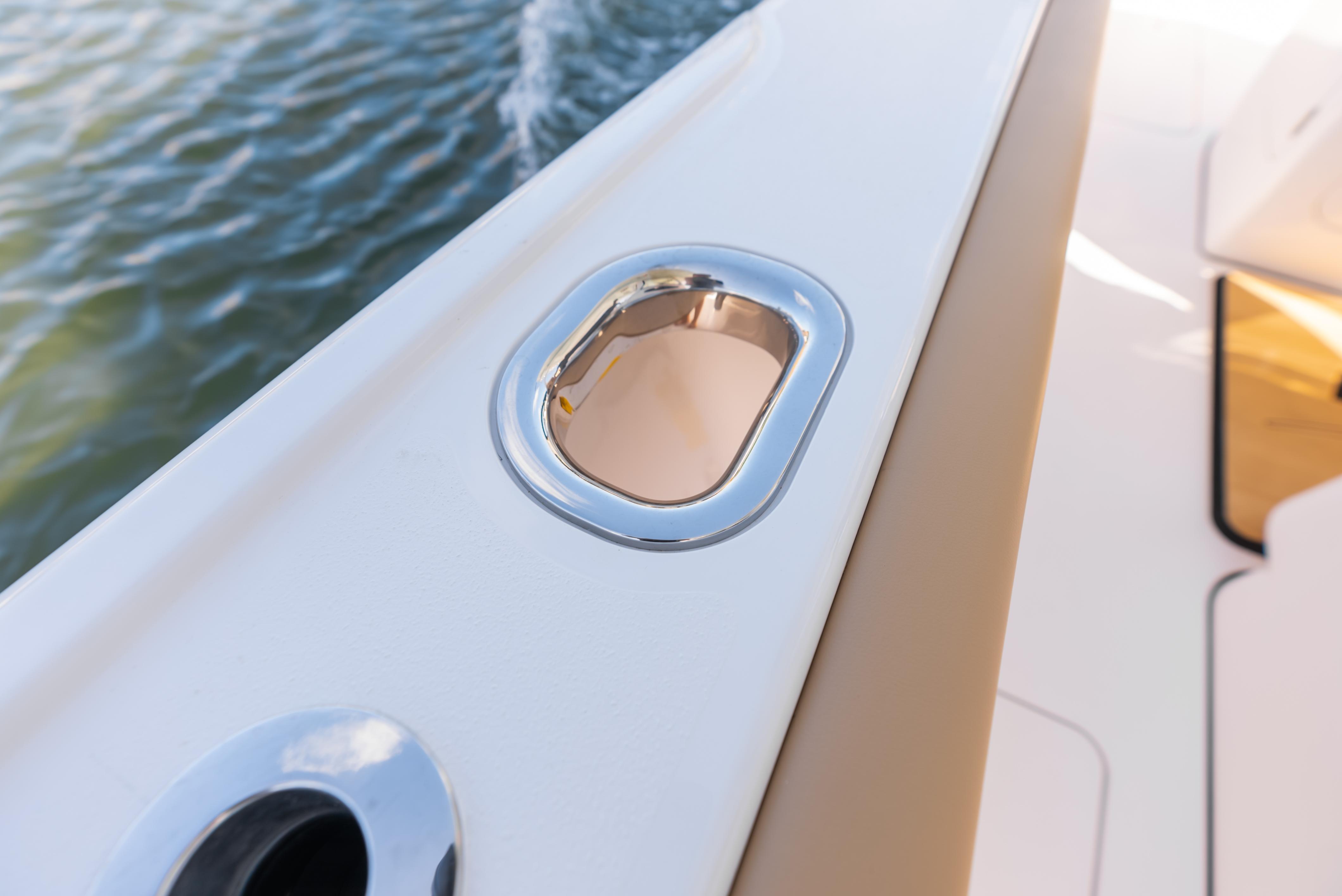Phenom 34 Center Console 2026 boat detail with chrome finish on deck.