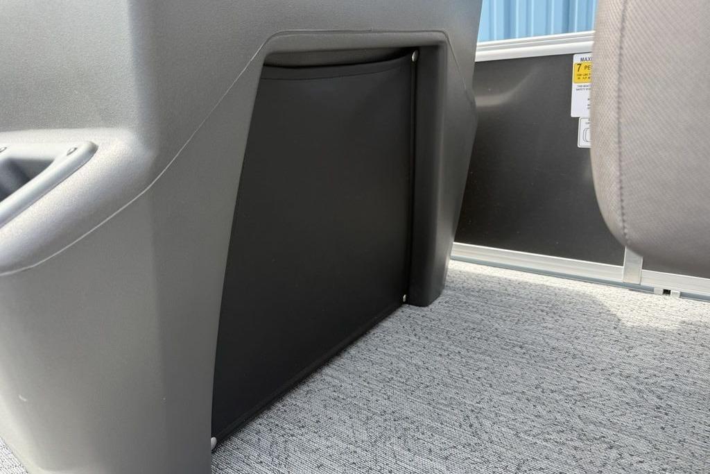 Interior view of 2026 Sun Tracker Bass Buggy 16 XL Select boat, featuring seating and storage area.