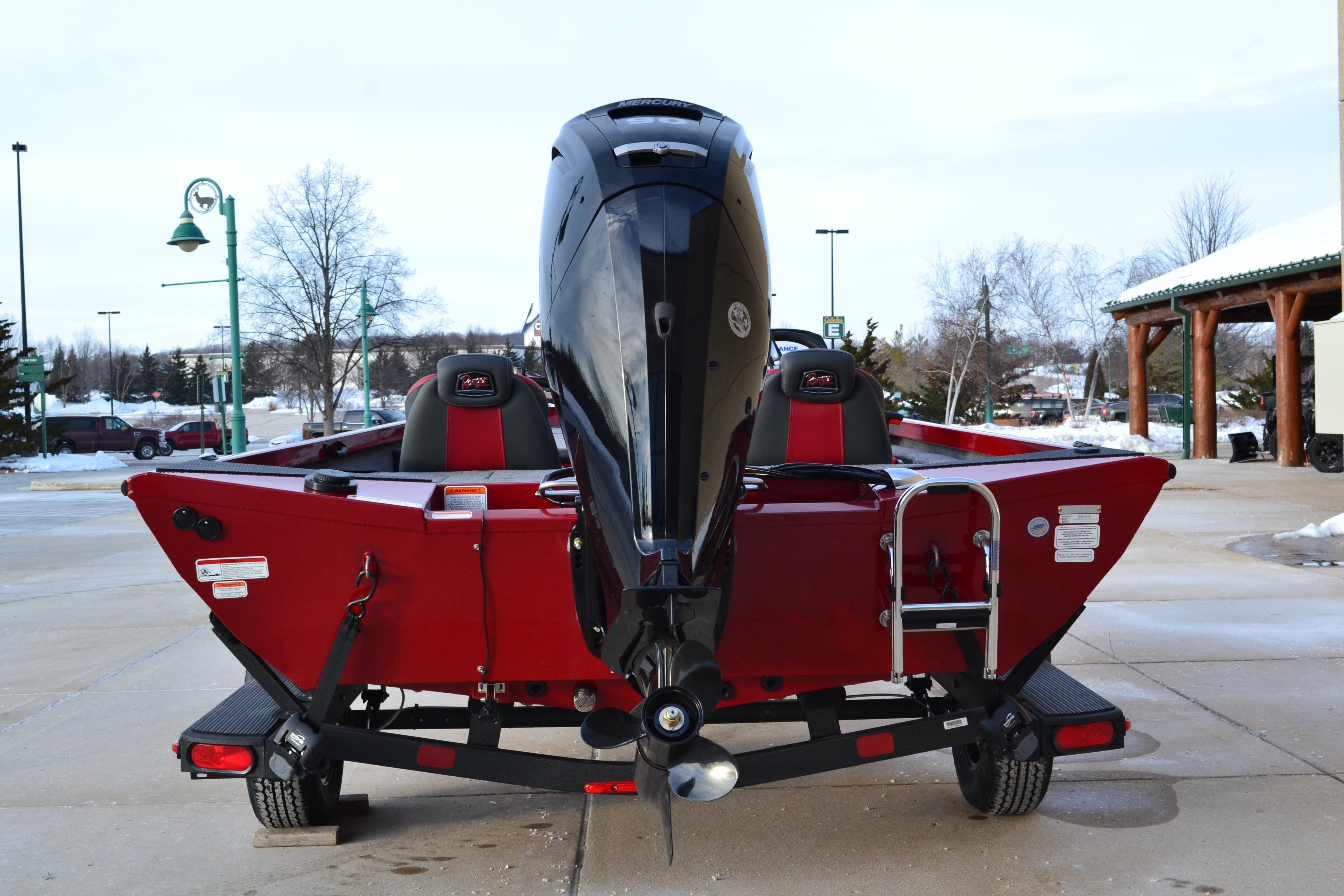 2026 Ranger RT188 boat, red exterior, parked on a trailer in a snowy setting.