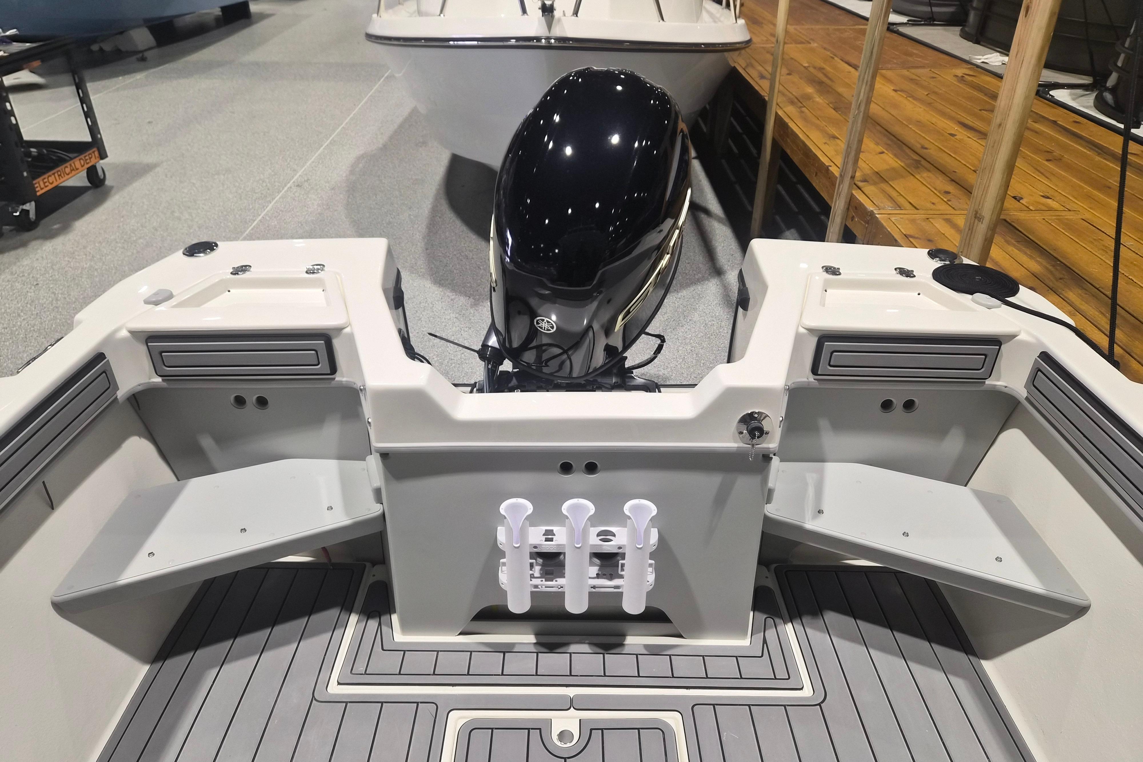 2026 Arima Sea Chaser 19 Yellowtail Edition boat interior with motor and storage compartments.