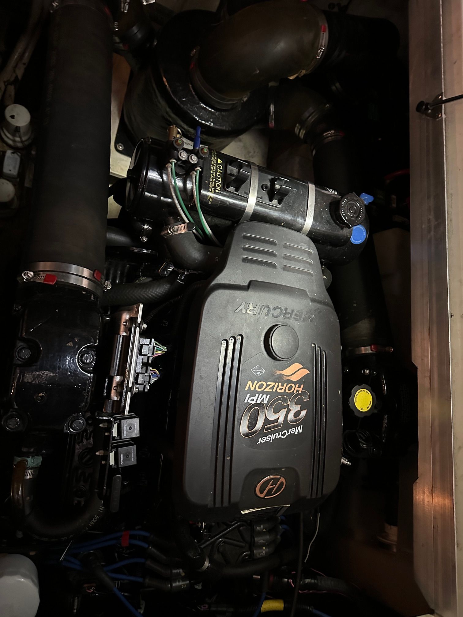 Engine compartment of a 2005 Sea Ray 290 Amberjack with MerCruiser 350 MPI.