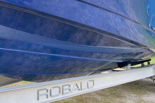 2017 Robalo R222 Center Console boat on trailer, close-up view.