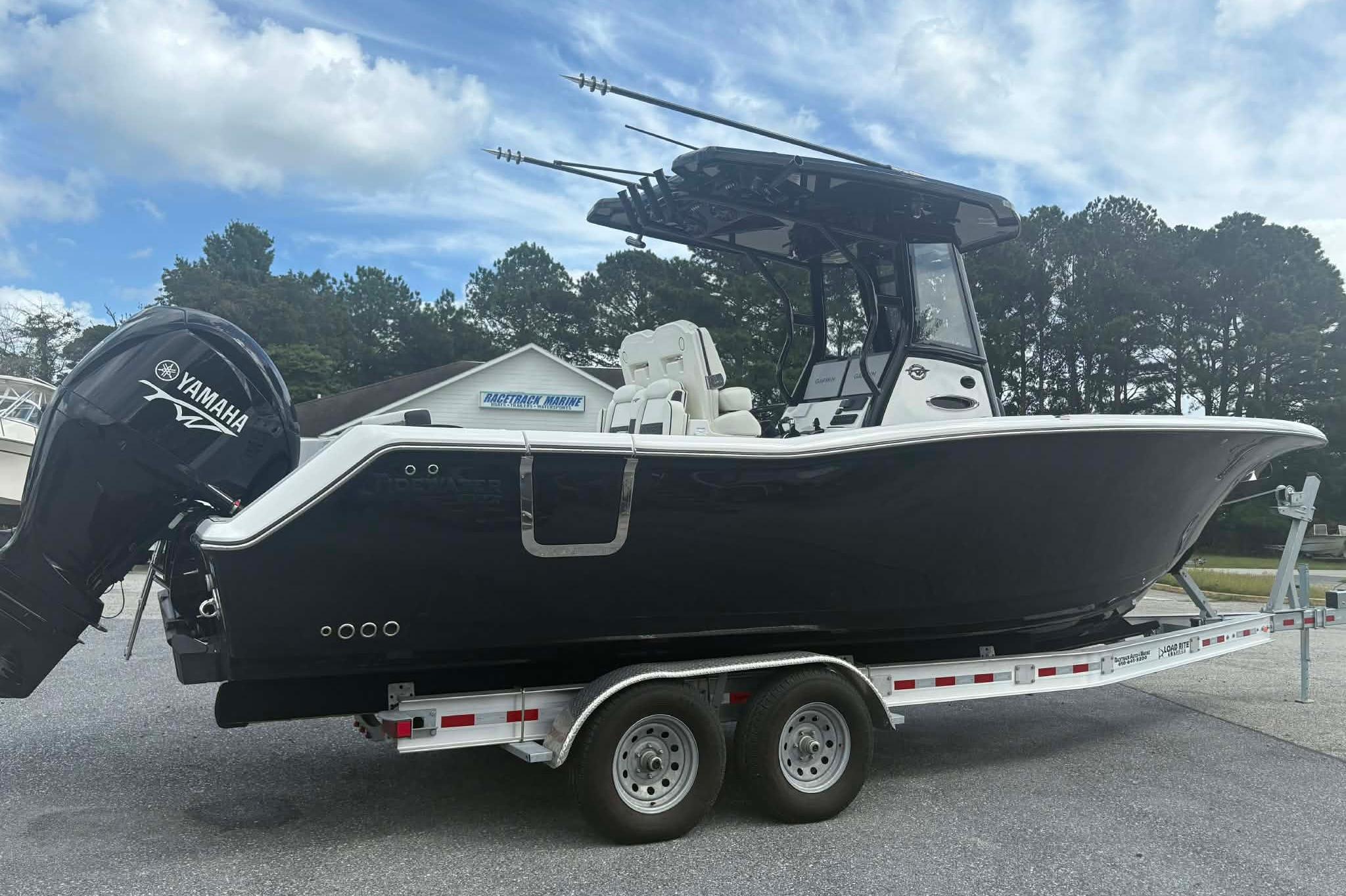 2026 Tidewater 282 CC Adventure boat on trailer, featuring Yamaha outboard motor.
