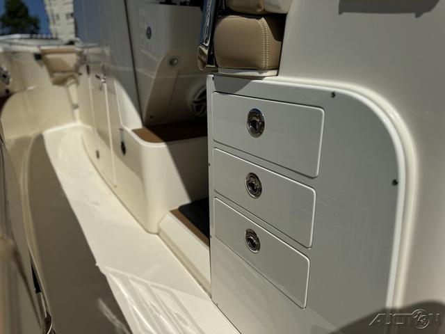 2022 Scout 330 LXF boat interior with storage compartments and seating.