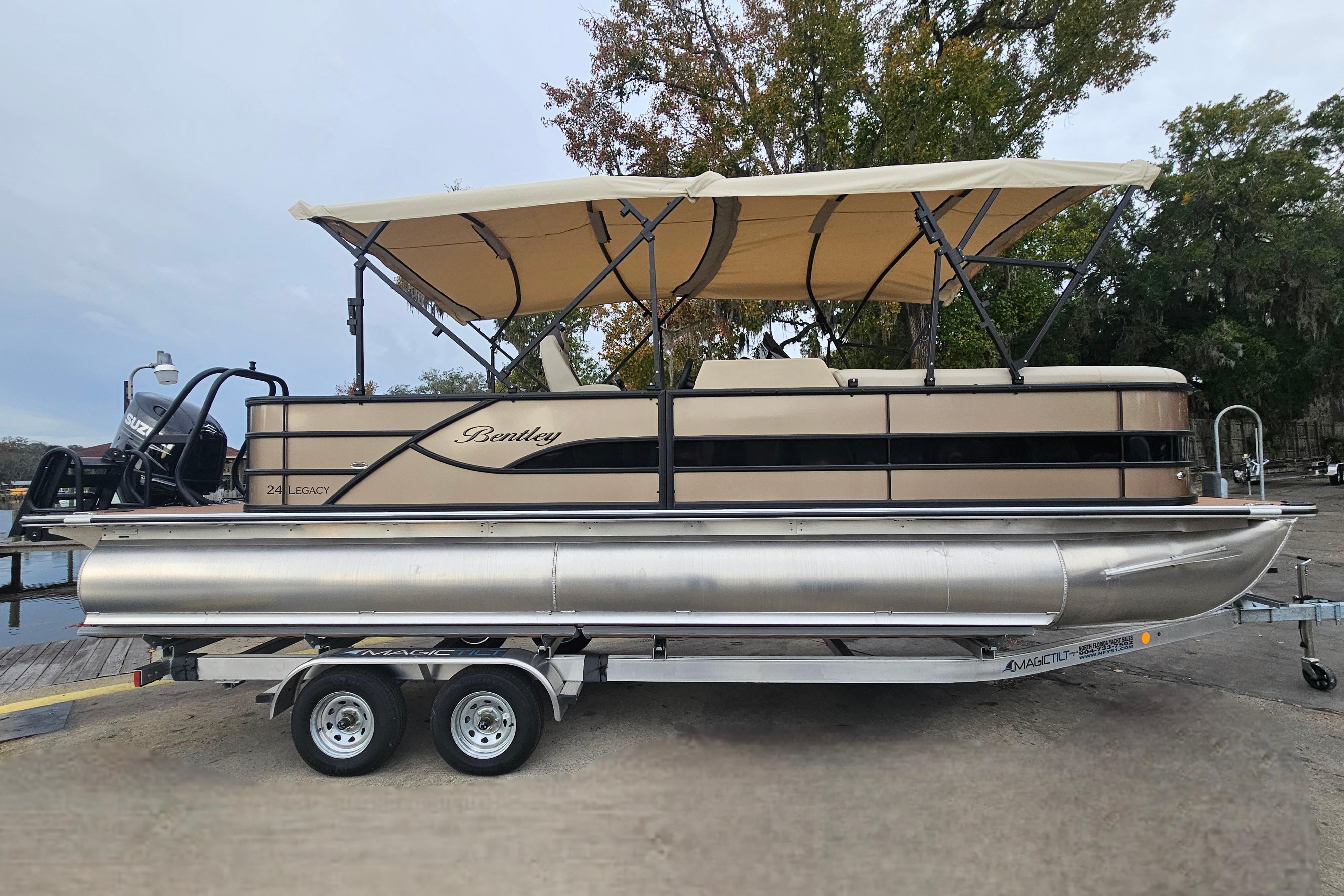 2026 Bentley Pontoons Legacy 243 Cruise on trailer, featuring beige canopy and sleek design.