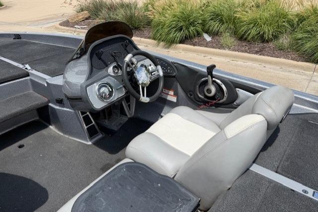2008 Ranger Z21 Comanche boat interior with steering wheel and control panel.