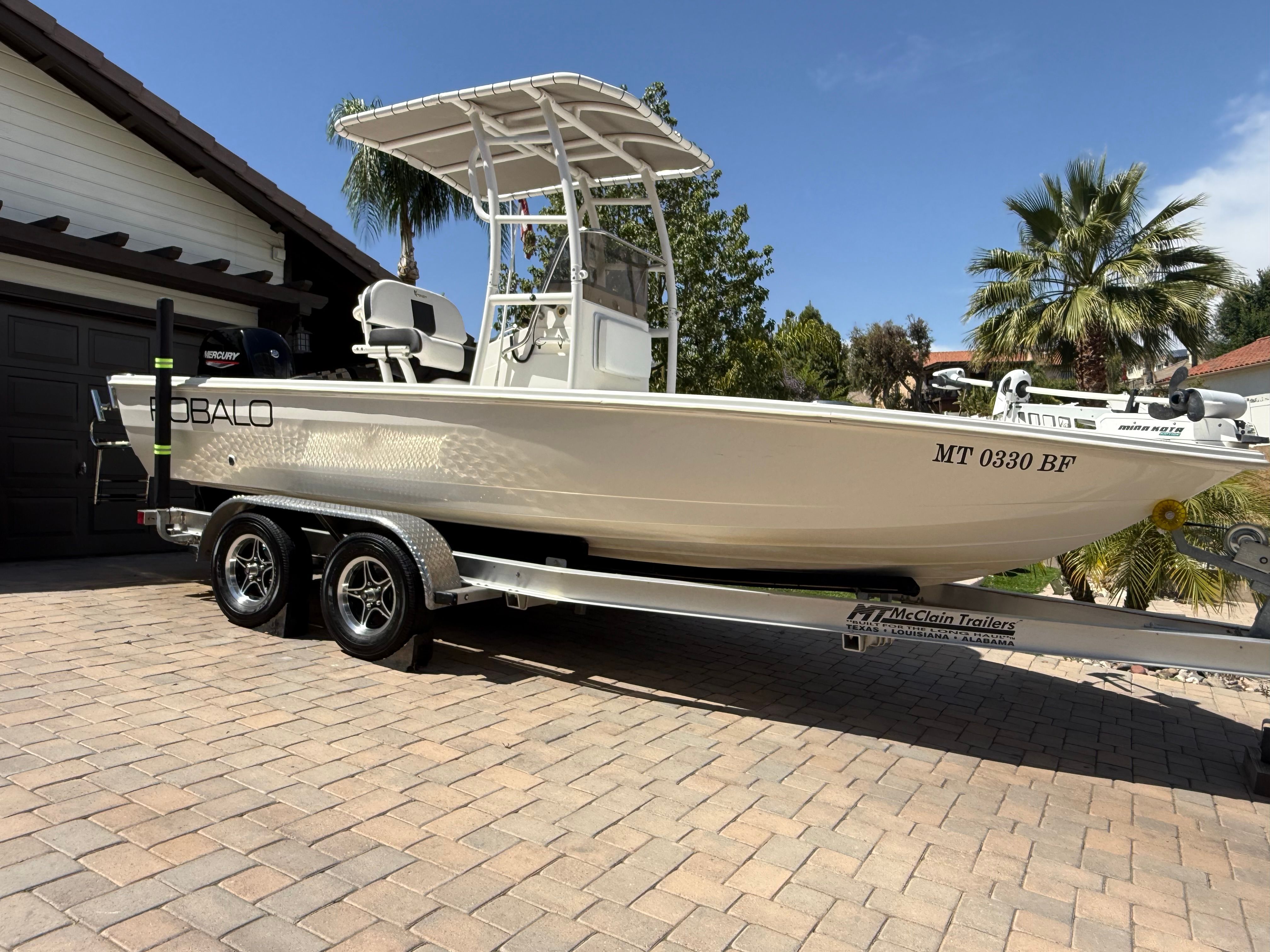 1998 Robalo 2100 Bay Hunter on trailer, side view.