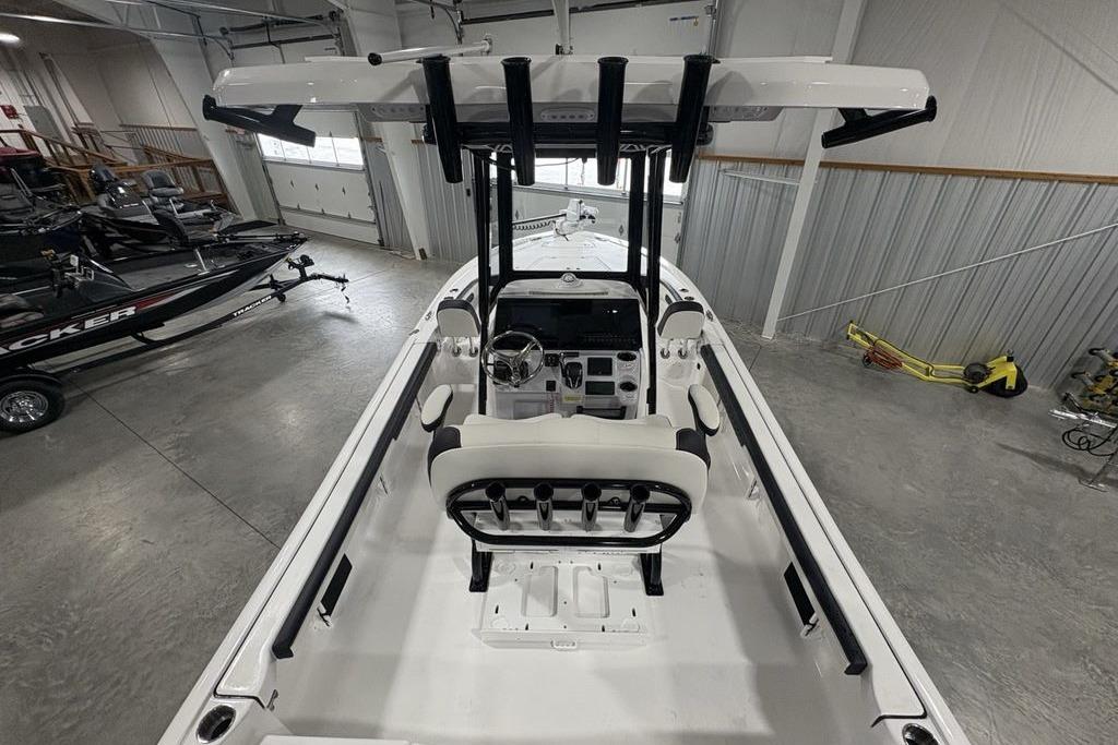 2026 Tidewater 2300 Carolina Bay boat in a showroom, interior view.