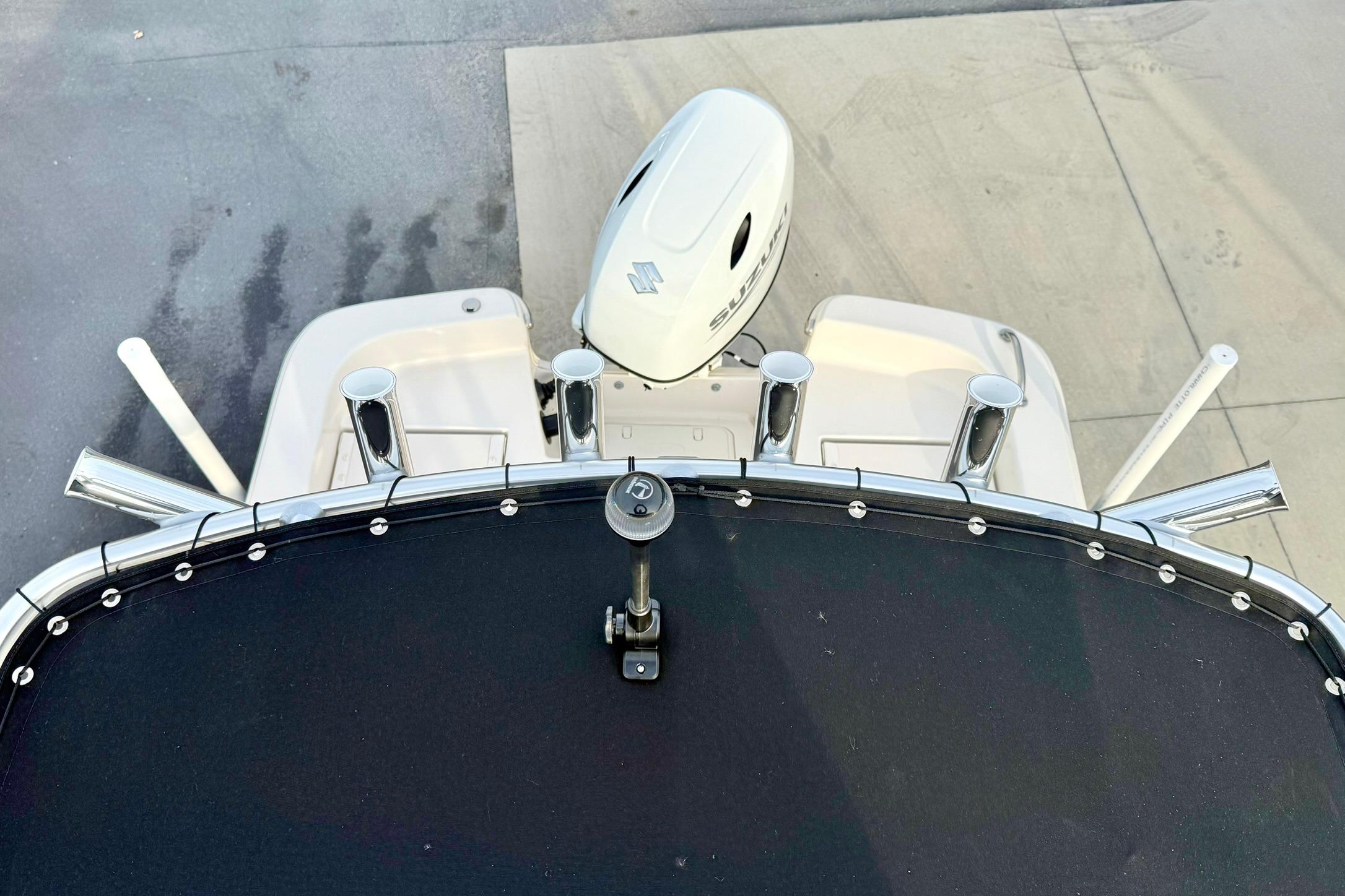 2025 Carolina Skiff 21 LS boat with Suzuki outboard motor, viewed from above.