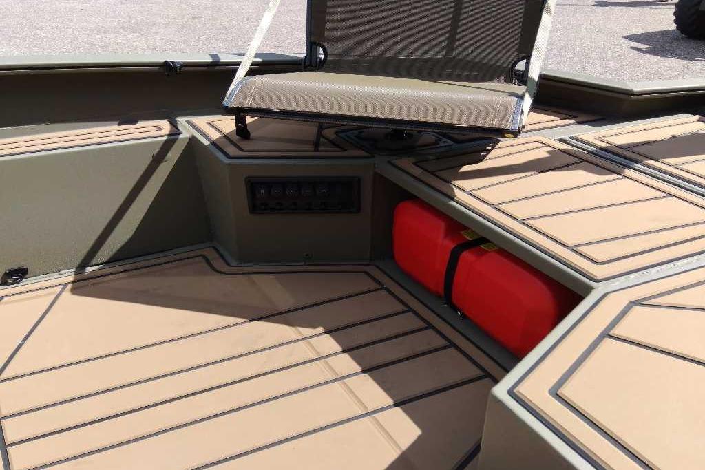 2026 Tracker Grizzly 1650 T Prairie Wings Edition boat interior with seating and storage.